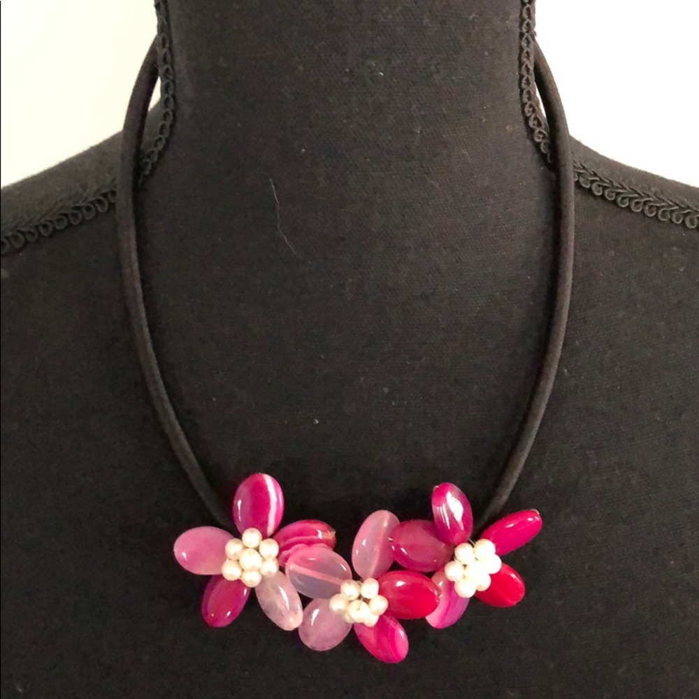 Free with any $50 purchase Black cord flowers